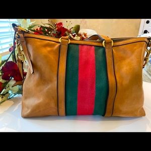 Gucci large tan leather Rania satchel.